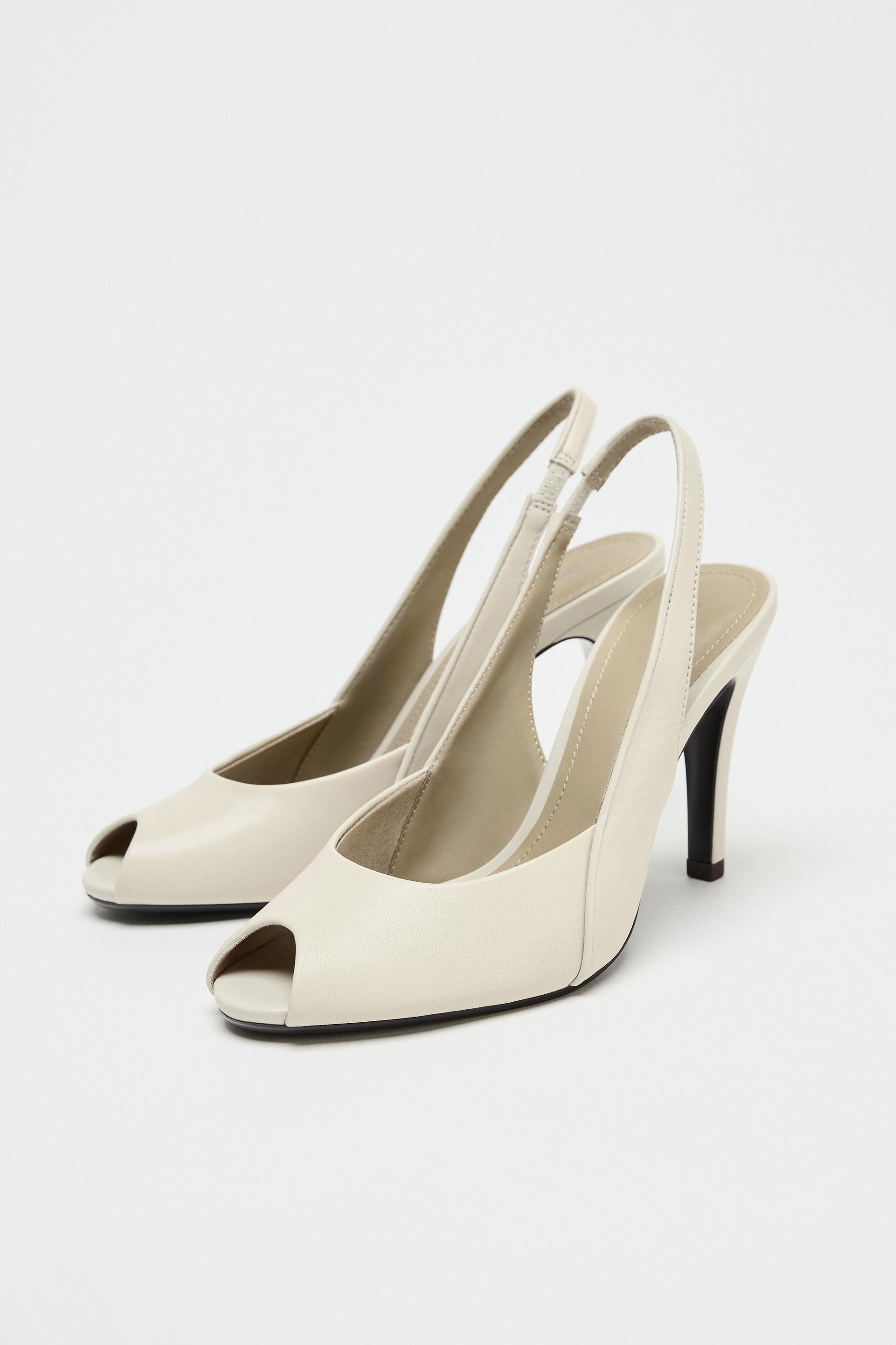 LEATHER HEELED SANDALS WITH OPENING DETAIL