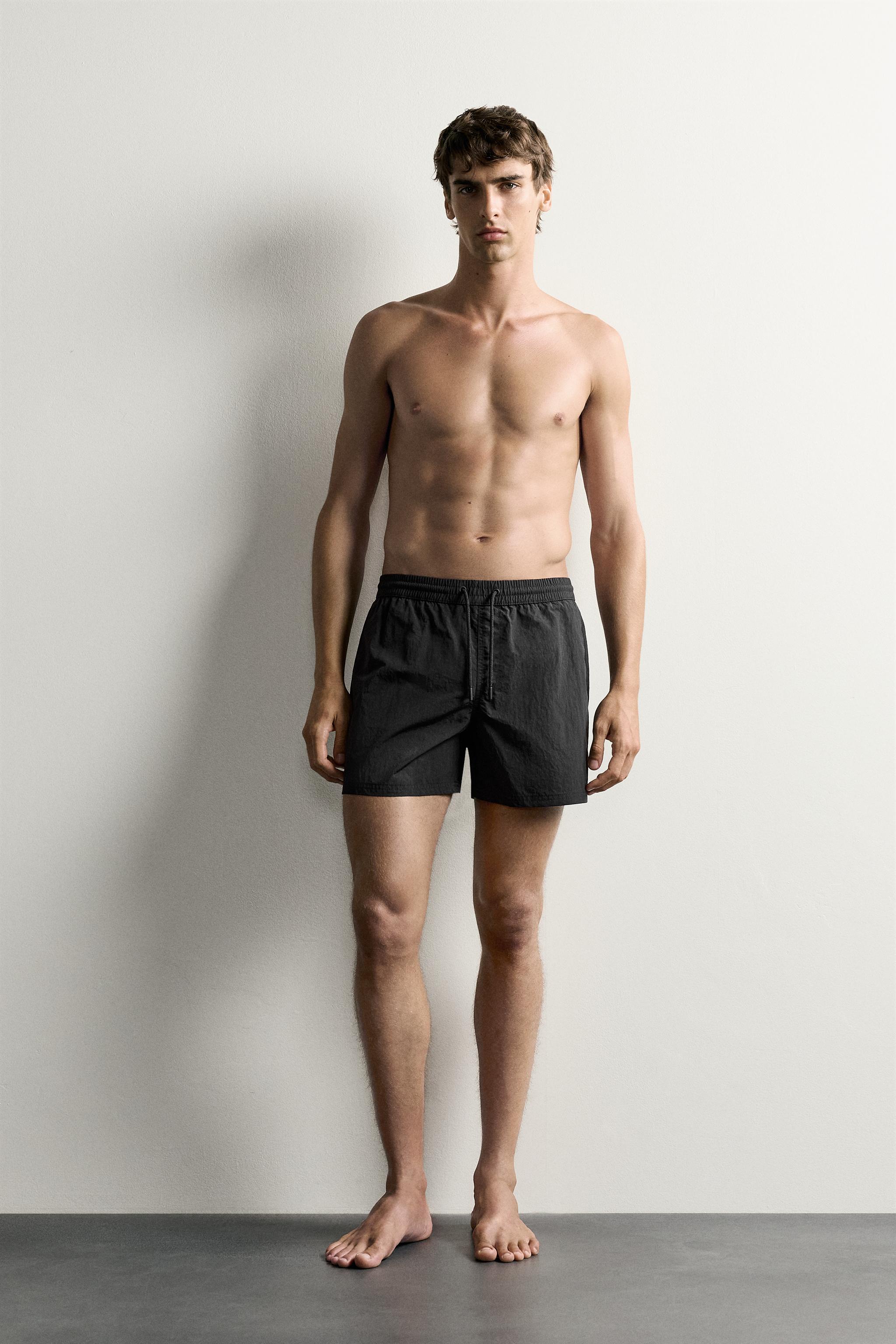 BASIC MID-LENGTH SWIMMING TRUNKS — Black (alternate view)