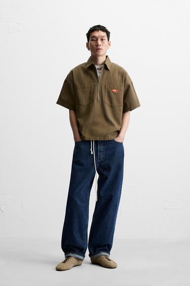 CAMISA POLO CREMALLERA - Marrón de Zara - Imagen 0