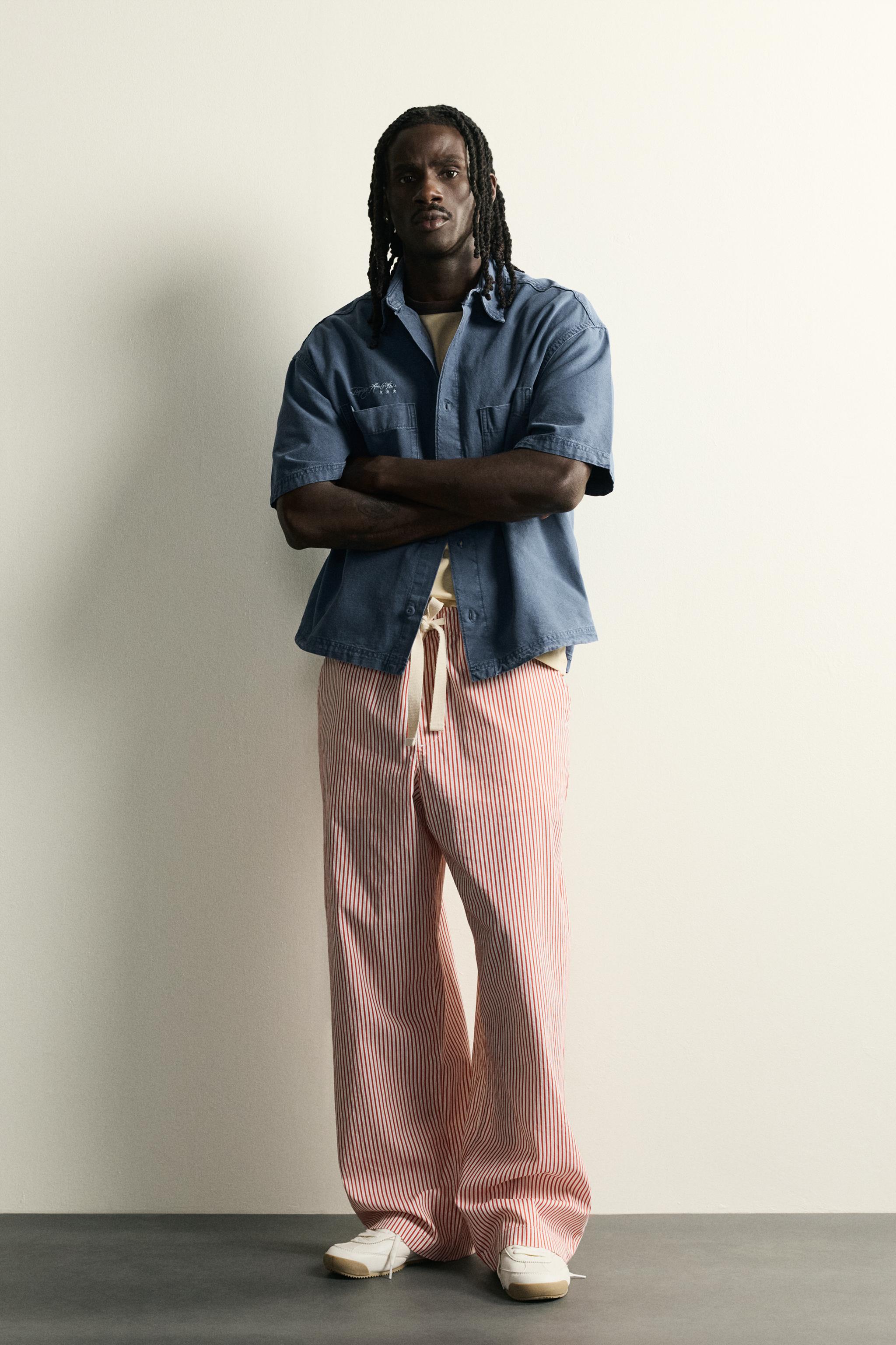 STRIPED BAGGY FIT PANTS
