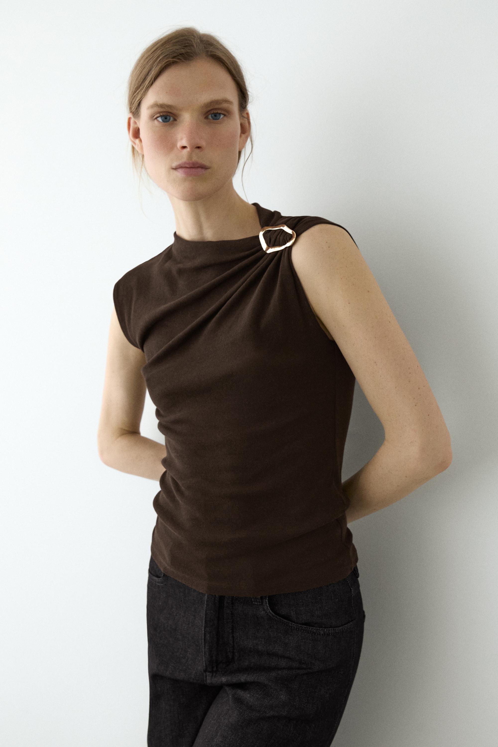 Asymmetric top with rhinestone detail