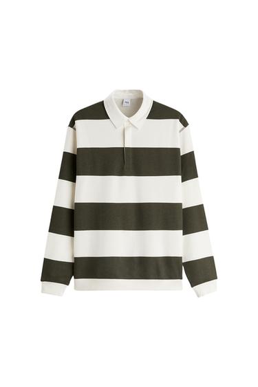 Front view of a black and white wide-striped polo shirt with a classic collar and long sleeves.