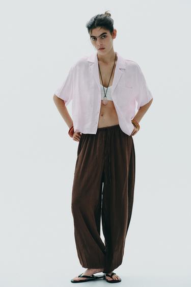 قميص منسدل بجيب - وردي الخاص بـ Zara