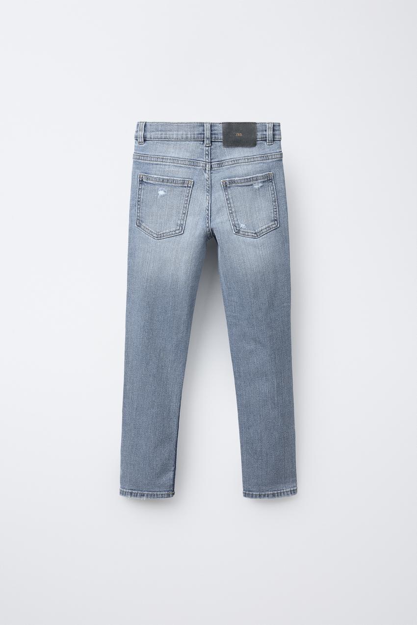 RIPPED SKINNY FIT JEANS