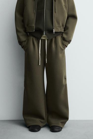 PANTALÓN WIDE FIT EFECTO NEOPRENO TACHA - Oliva de Zara