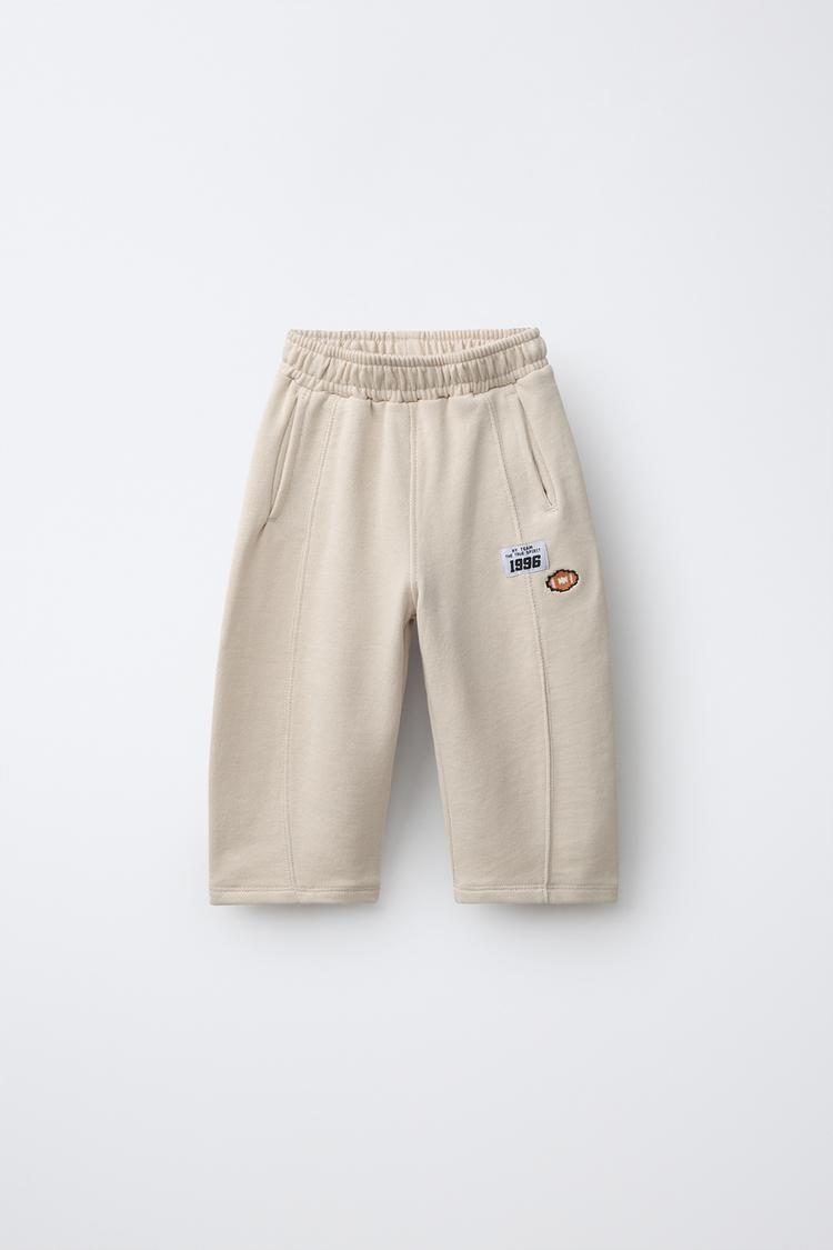 VARSITY BARREL PANTS — Light beige