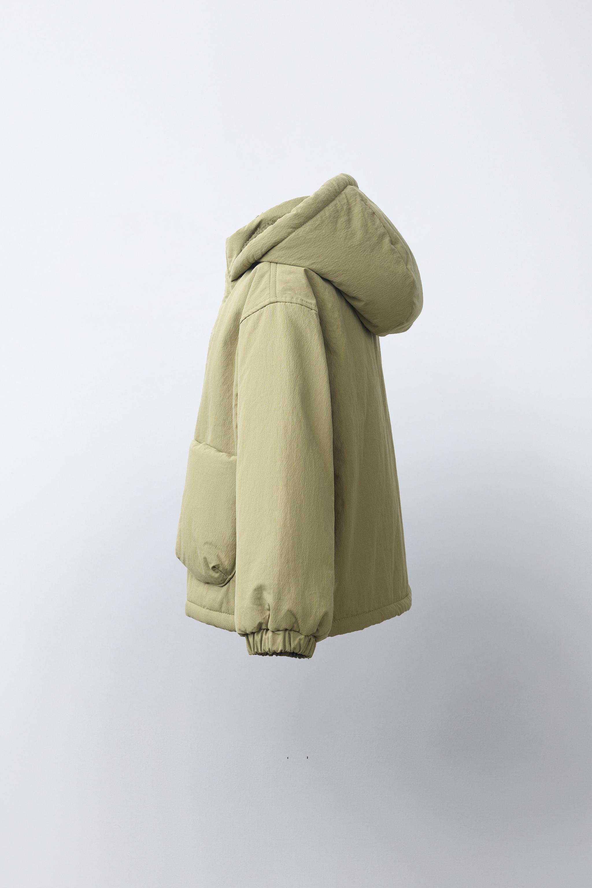 BLOUSON À CAPUCHE EFFET MOUTON