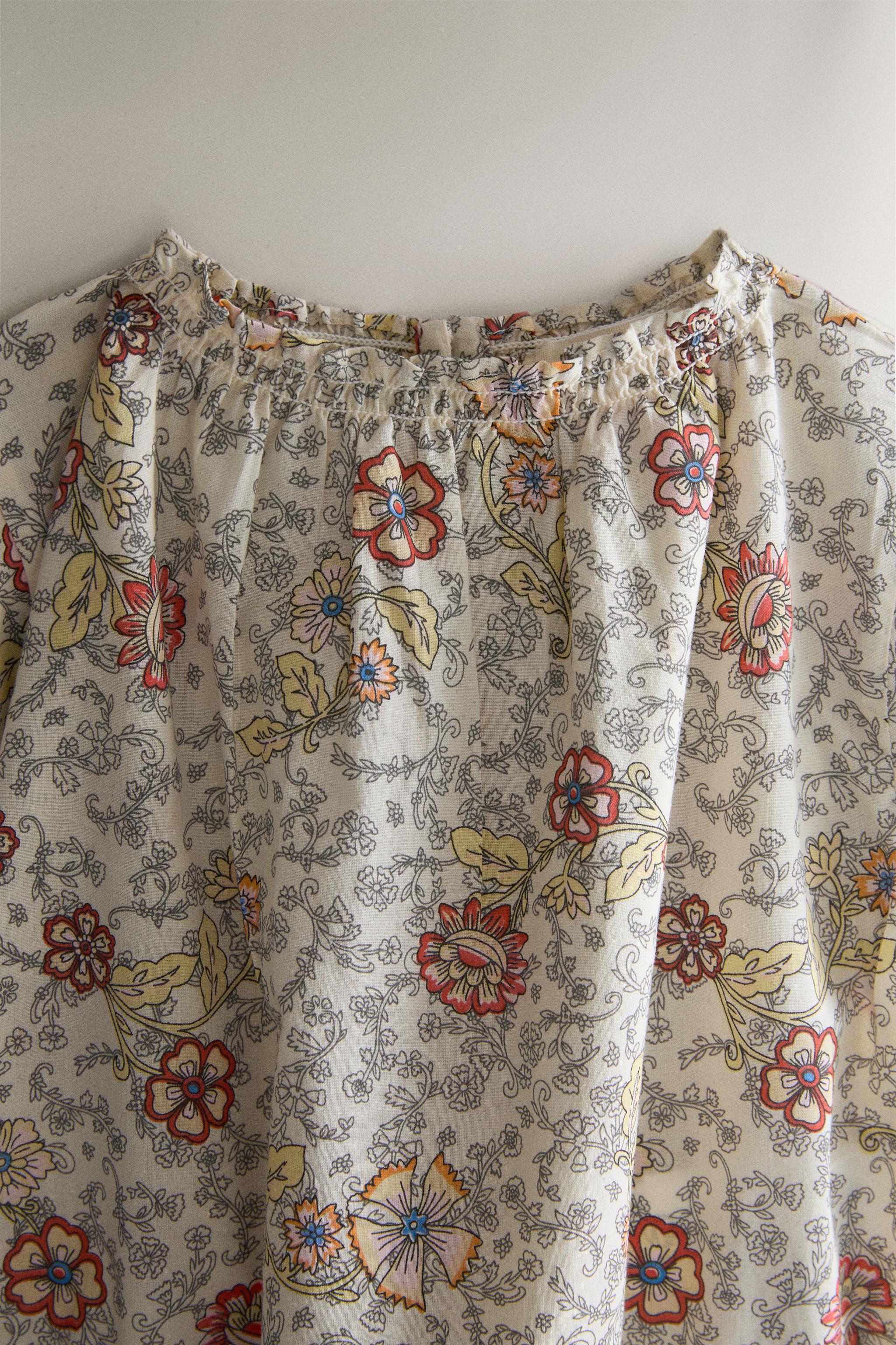 BABY FLORAL FOOTED ROMPER — Light beige