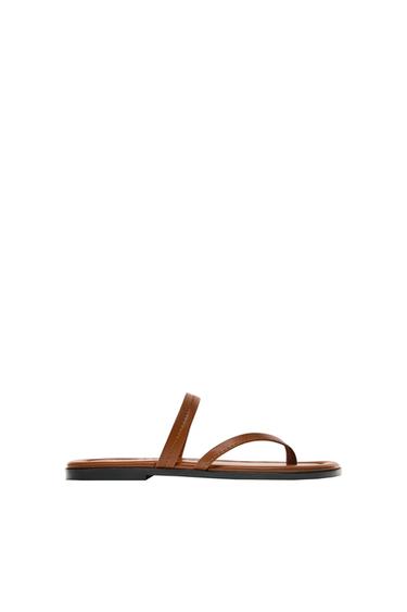 FLAT ASYMMETRIC SANDALS