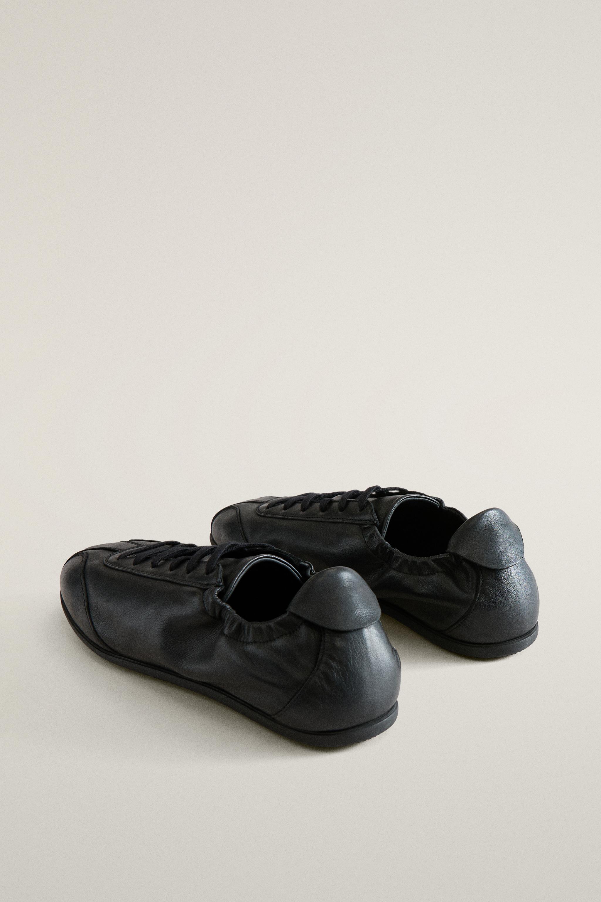 CHAUSSONS TENNIS EN CUIR