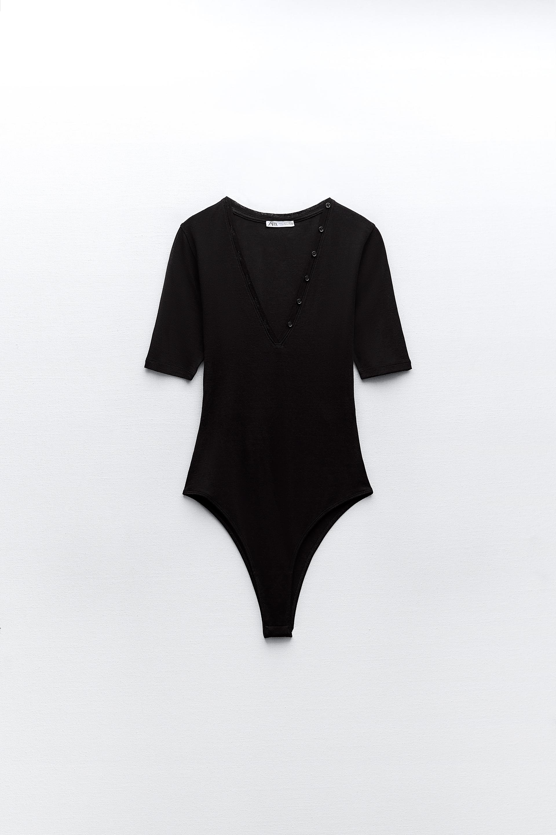 BODYSUIT WITH A V-NECKLINE AND BUTTONS