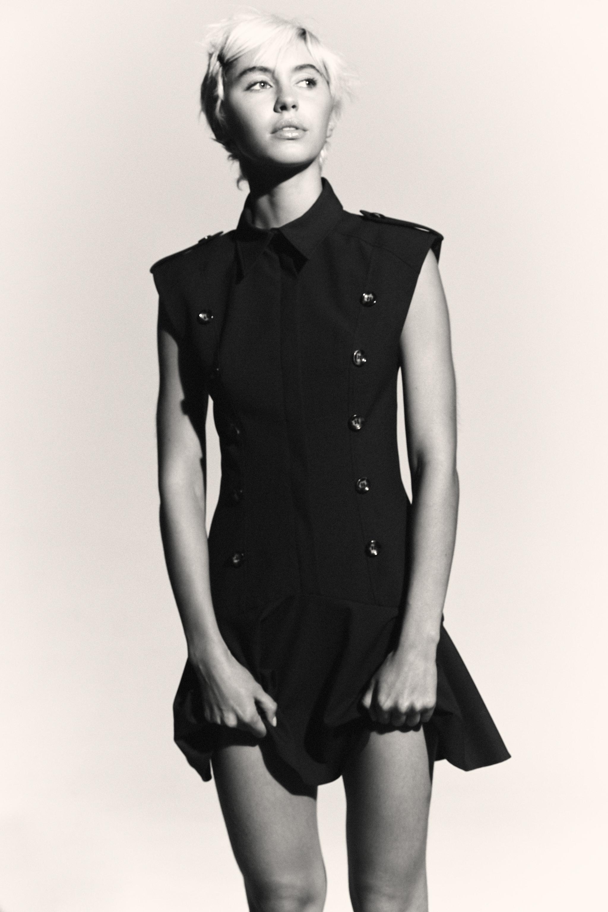 SHORT DRESS WITH SHOULDER PADS AND RUFFLES