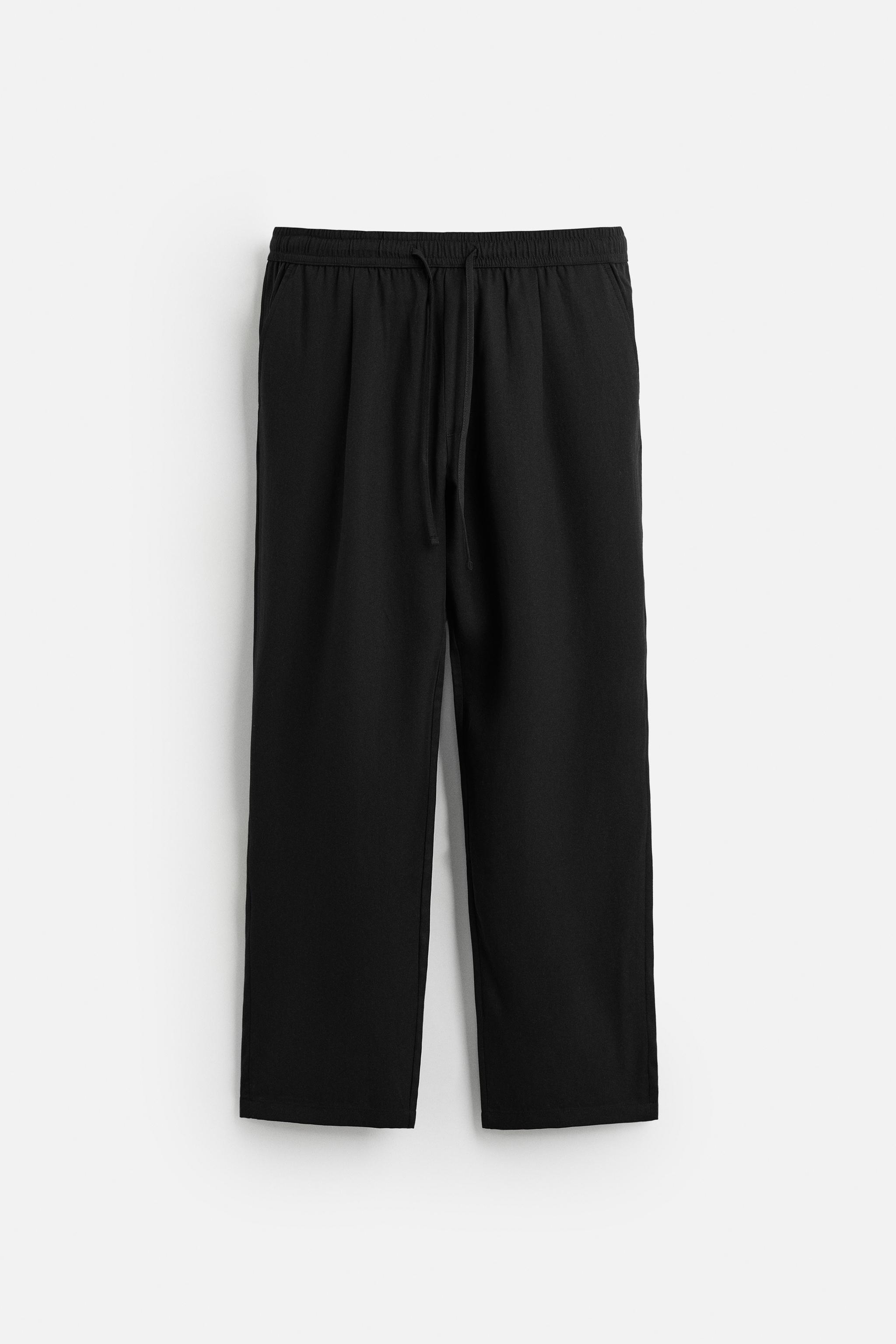 RELAXED FIT FLOWY PANTS