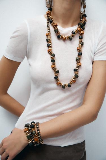 PACK OF 4 WOODEN BRACELETS - Brown by Zara