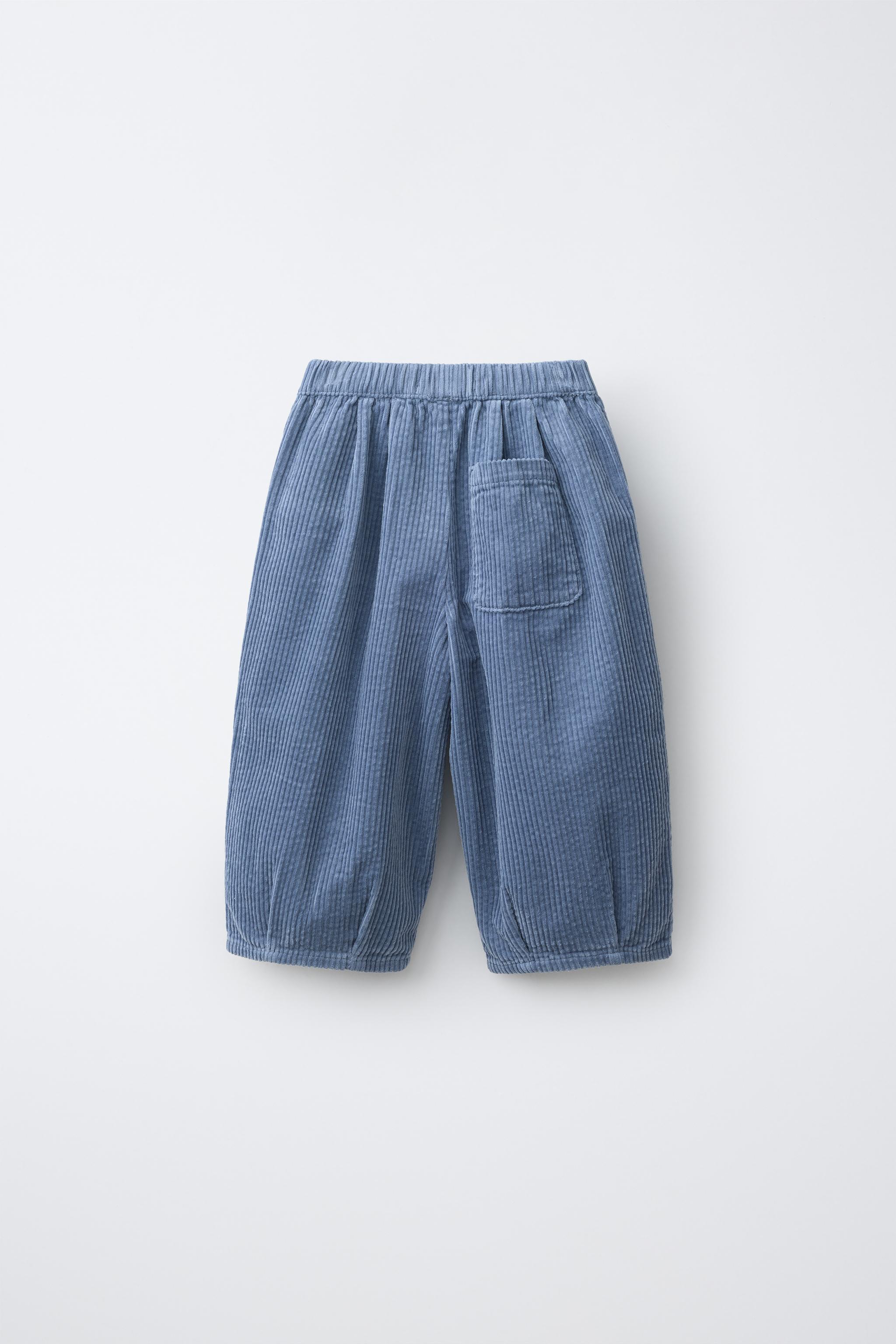 PANTALON BALLOON EN VELOURS CÔTELÉ À PINCES