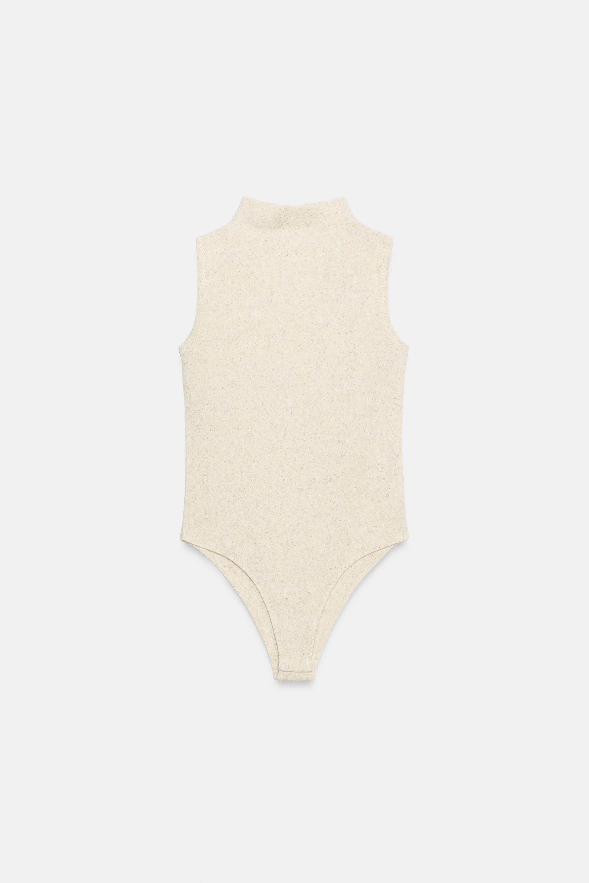 SLEEVELESS BODYSUIT