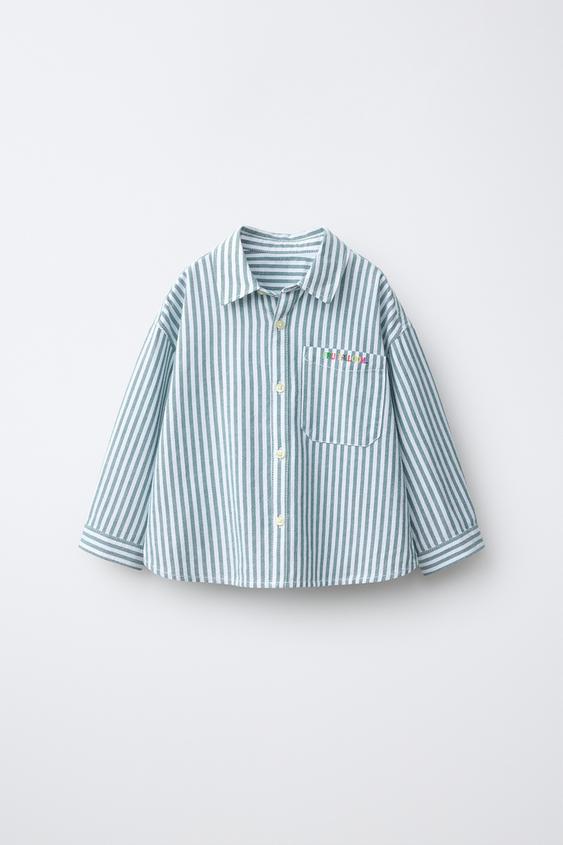 قميص مقلم بنص مطرز Fruit of the Loom™ - خطوط الخاص بـ Zara - صورة 0