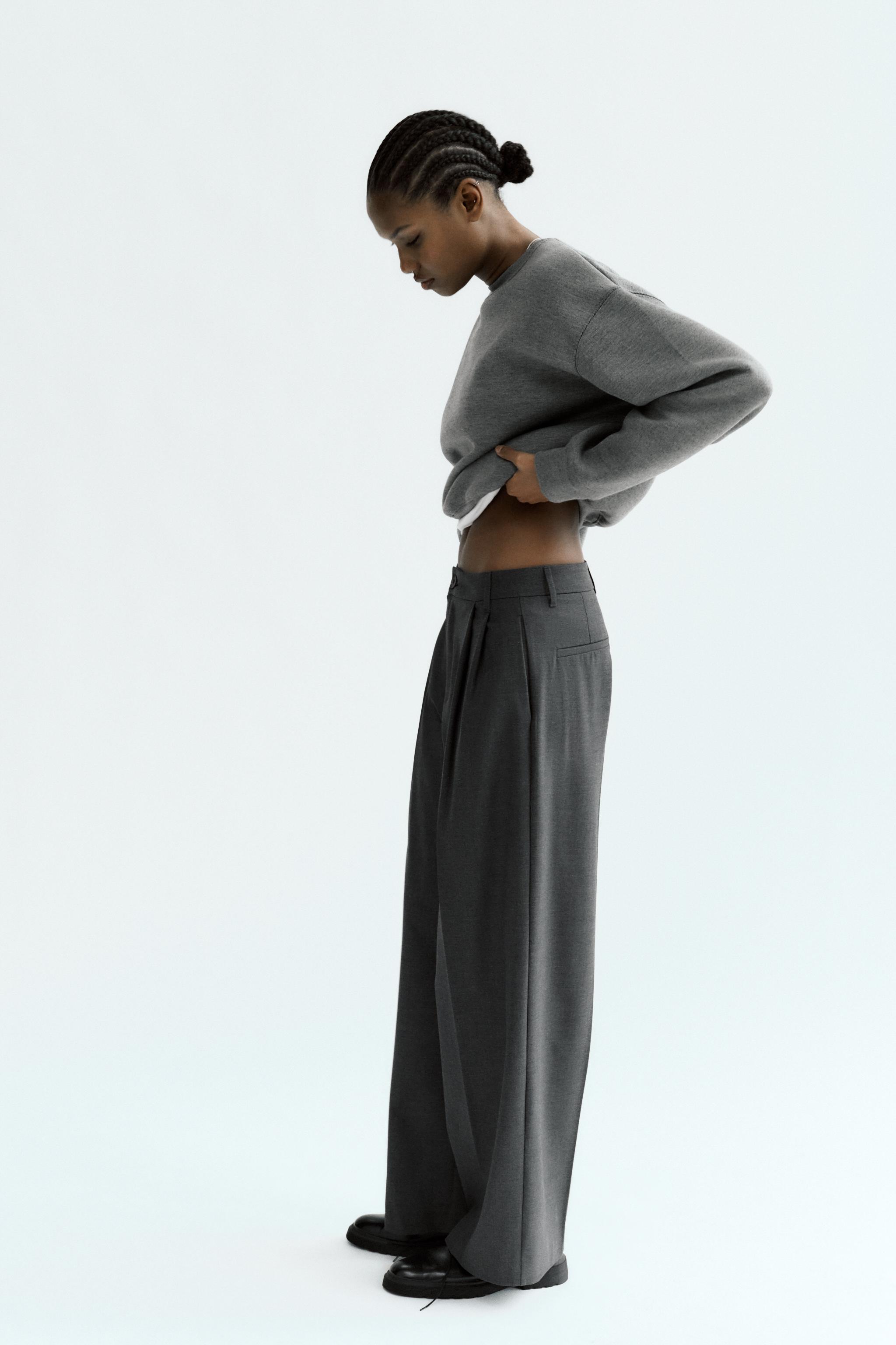 Try XS PLEATED PANTS WITH BUTTONS from Zara