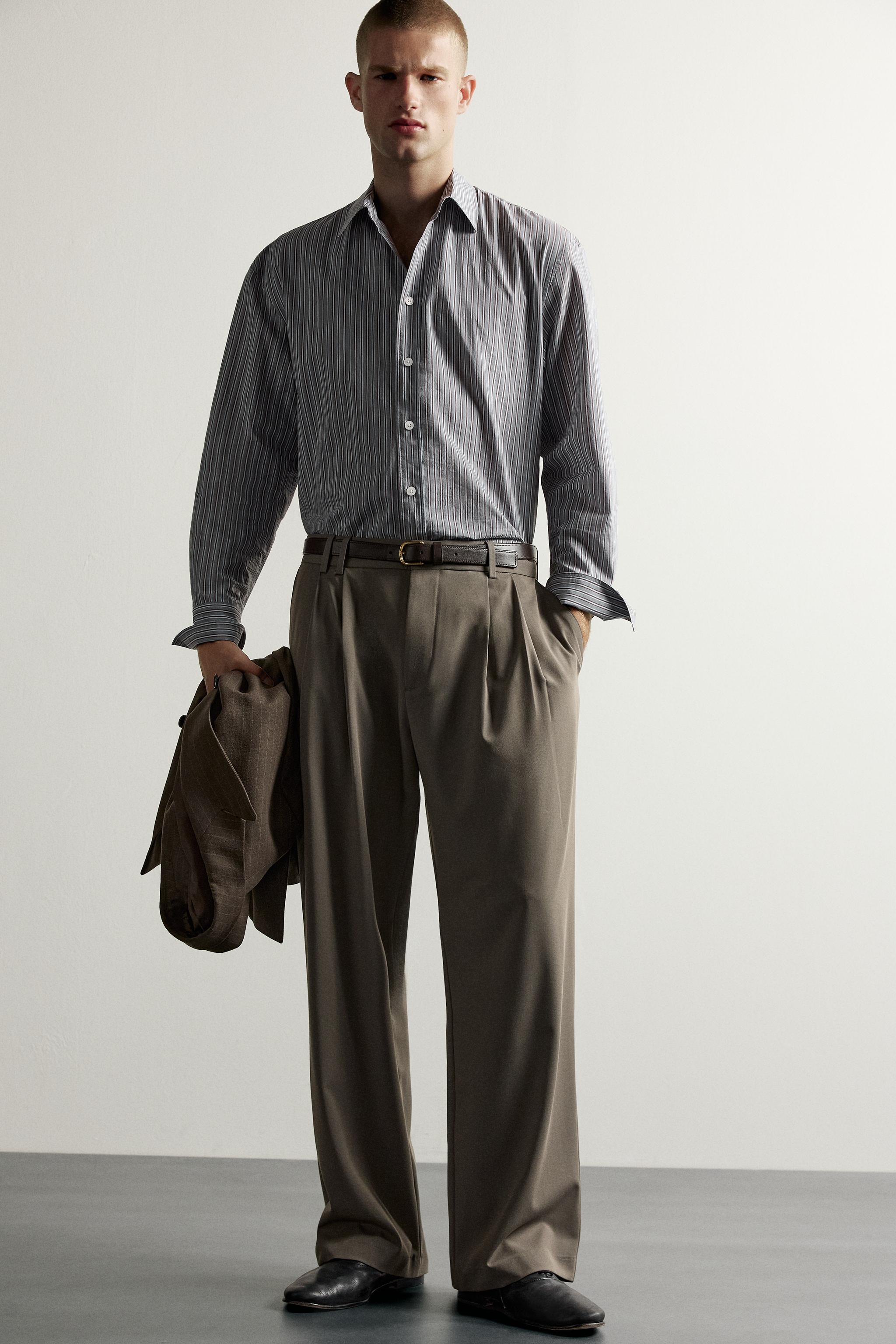 PANTALON WIDE FIT À PLIS