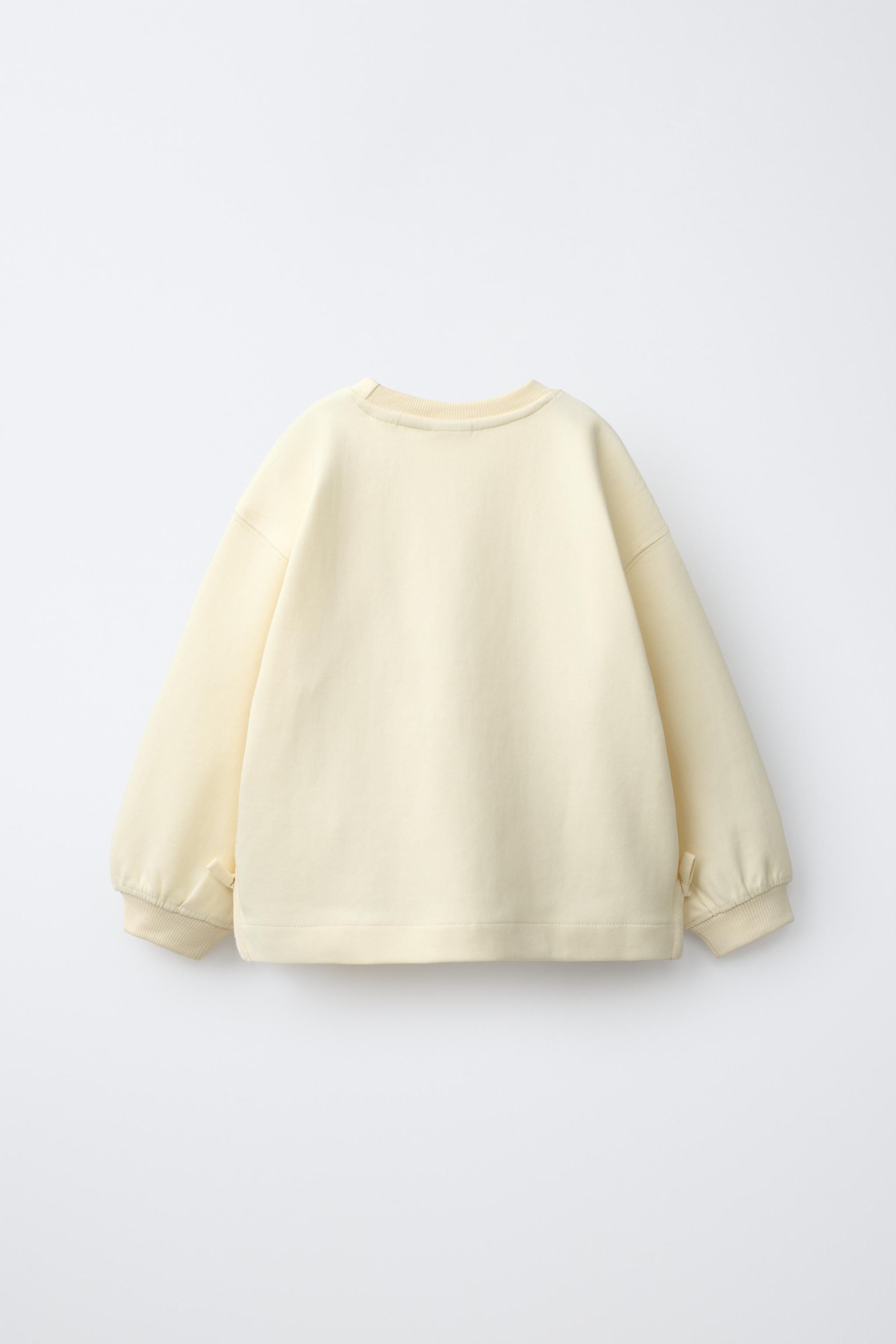 INTERLOCK BOW AND HEART SWEATSHIRT — Butter