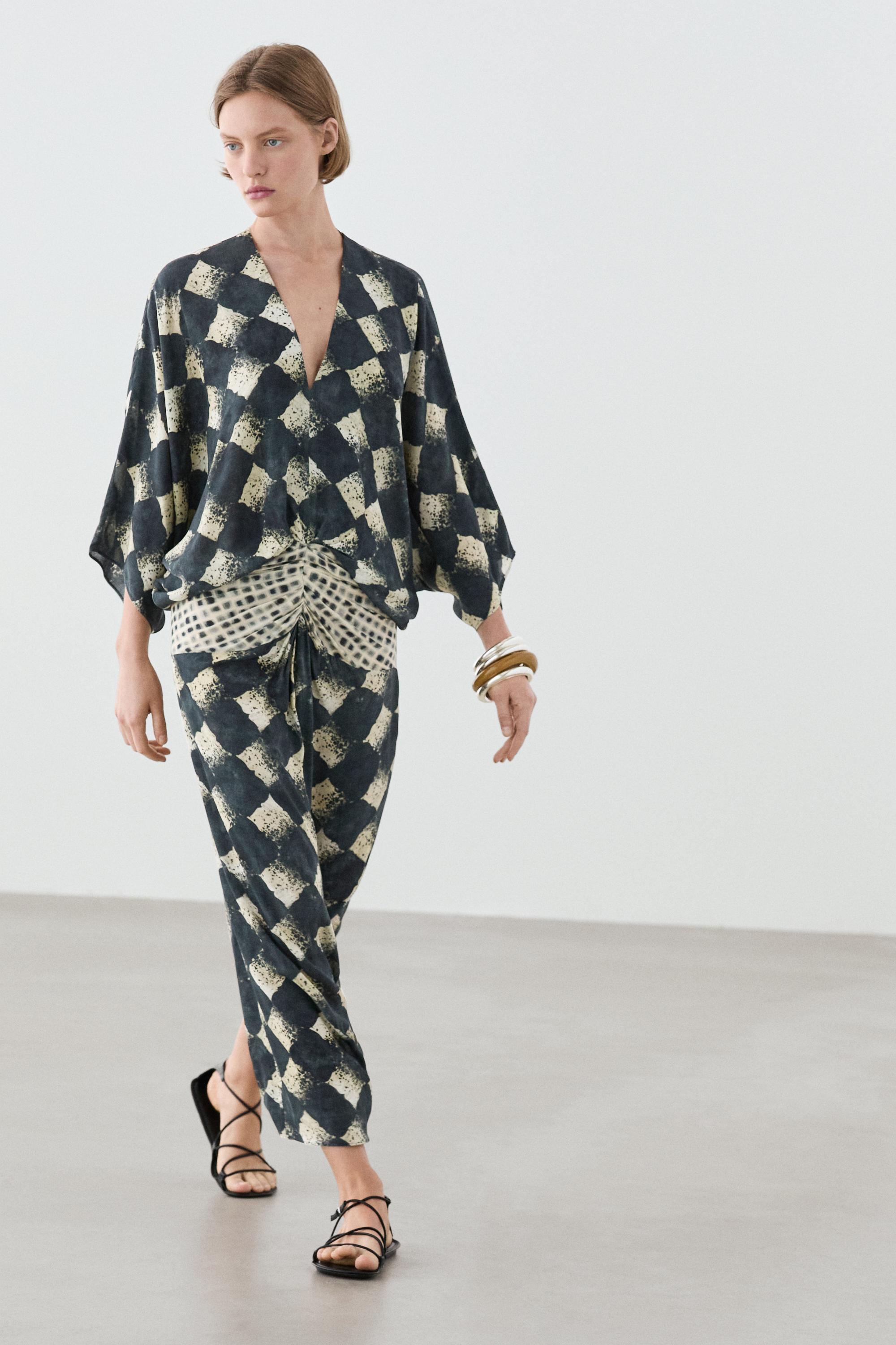 Flowing dress with sash belt detail