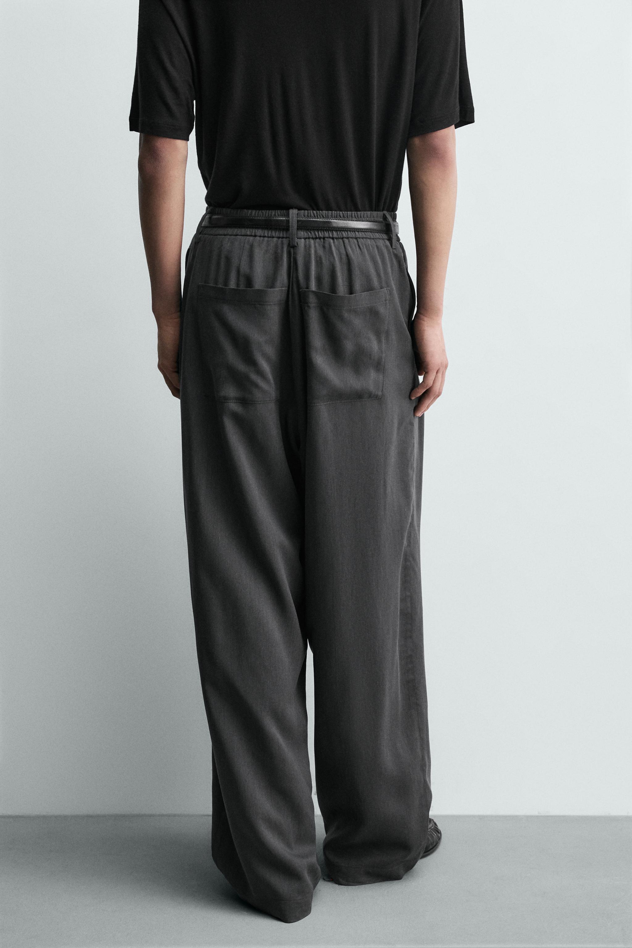 FLOWY PLEATED PANTS
