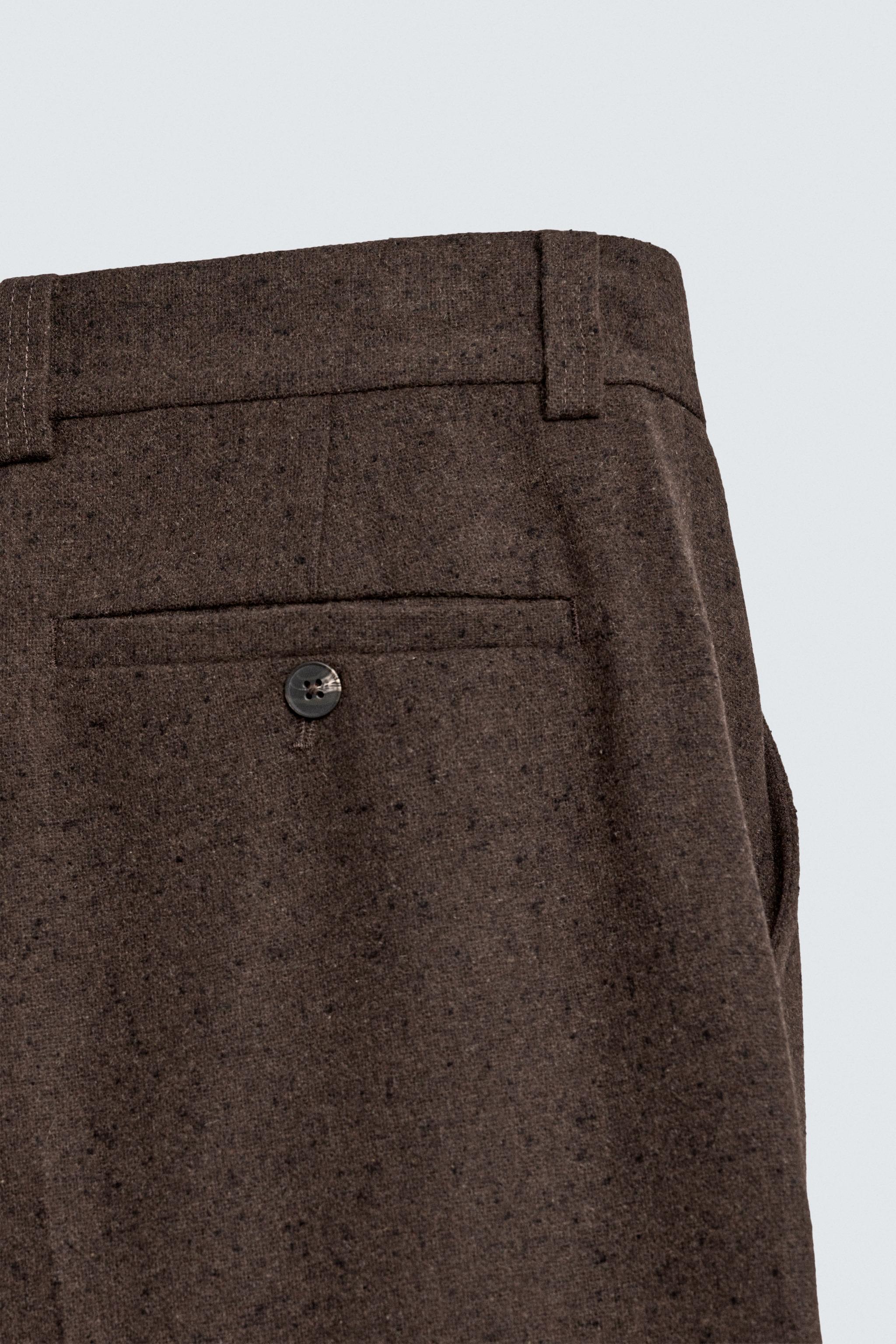 PANTALON BOUTONNÉ À PLIS