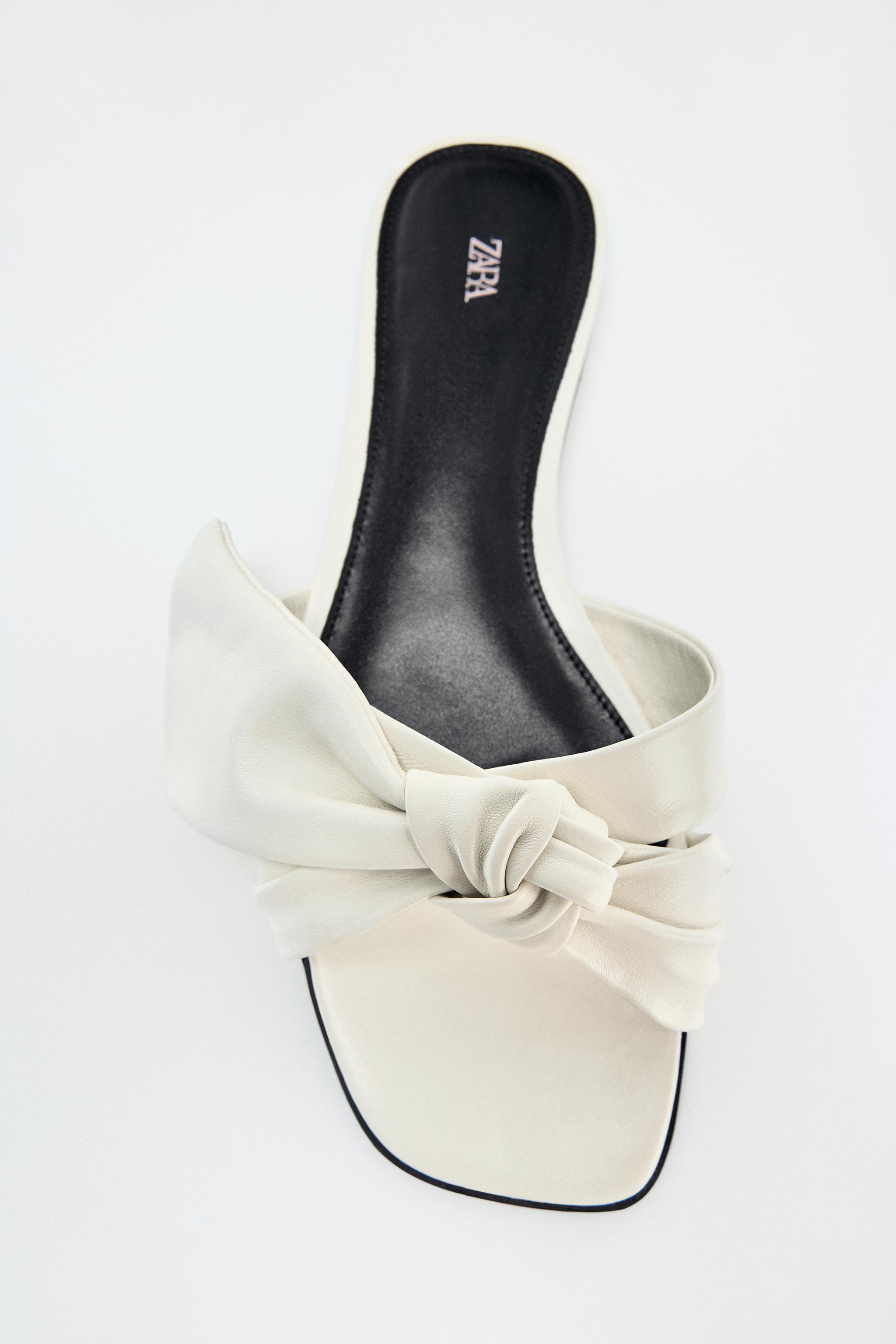 LEATHER BOW FLAT SANDALS