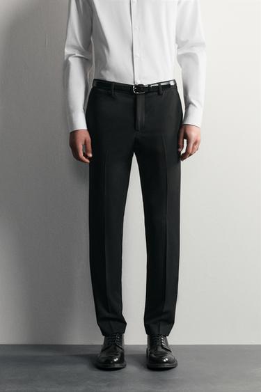 بنطلون بدلة مريح - أسود الخاص بـ Zara