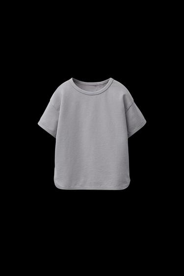 UNIFARBENES T-SHIRT MIT BIESEN - Grau von Zara