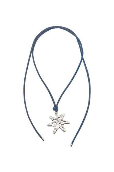 Blue cord necklace with an engraved silver star pendant. Tie fastening.