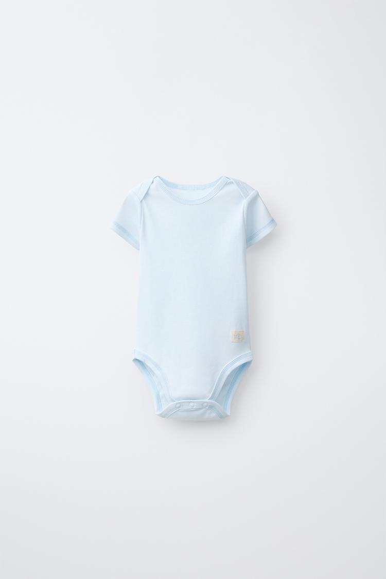 PAQUETE DE 5 BODYS DE MANGA CORTA CON ETIQUETA 2