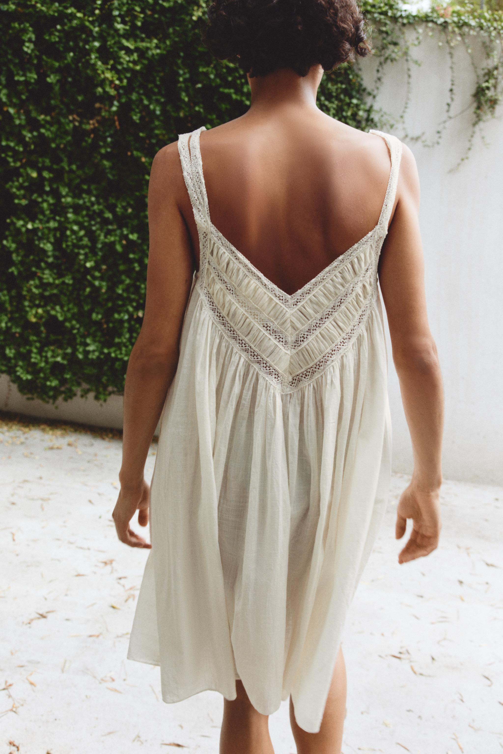 FLORAL EMBROIDERED PLEATED DRESS