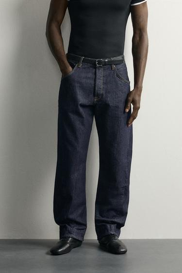 STRAIGHT-FIT JEANS WITH TWISTED SEAMS — Indigo 2