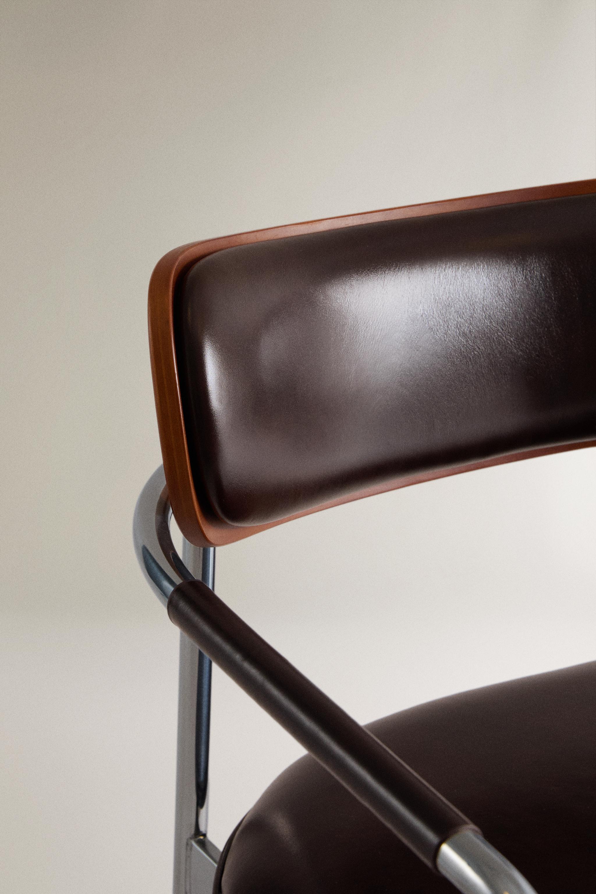 LEATHER AND STAINLESS STEEL CHAIR