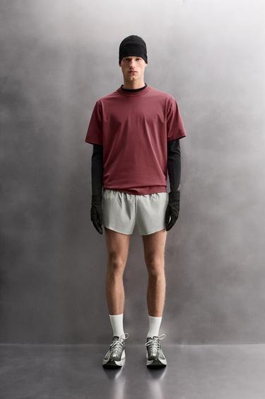 LIGHTWEIGHT RUNNING SHORTS - Pearl grey by Zara