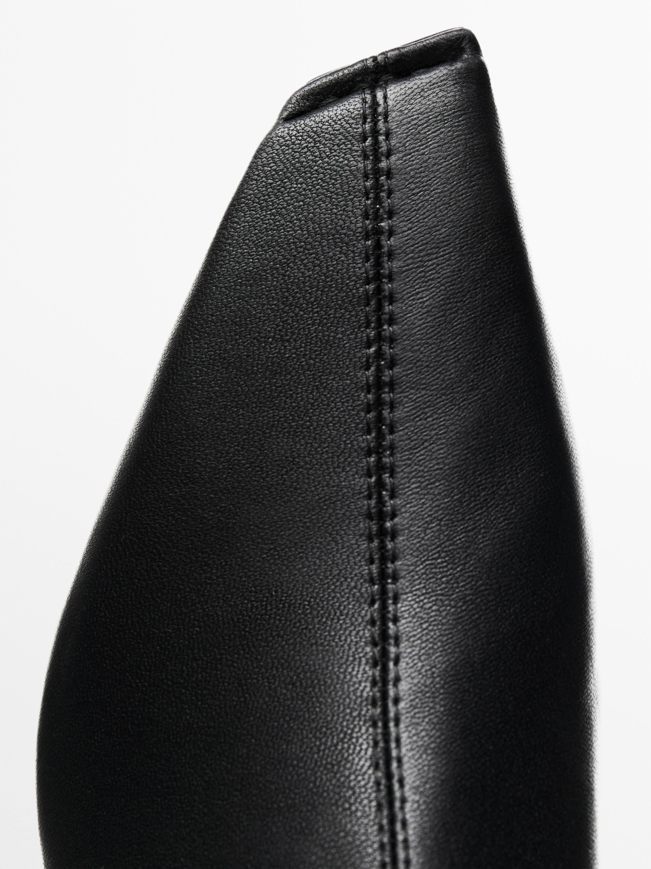 Stretch heeled boots