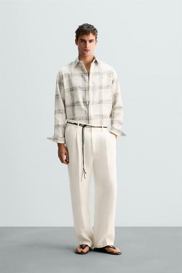 PANTALÓN 100% LINO PLIEGUES LIMITED EDITION - Crudo de Zara - Imagen 0