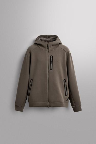 سويت شيرت تقني بسحاب وغطاء رأس - رمل الخاص بـ Zara