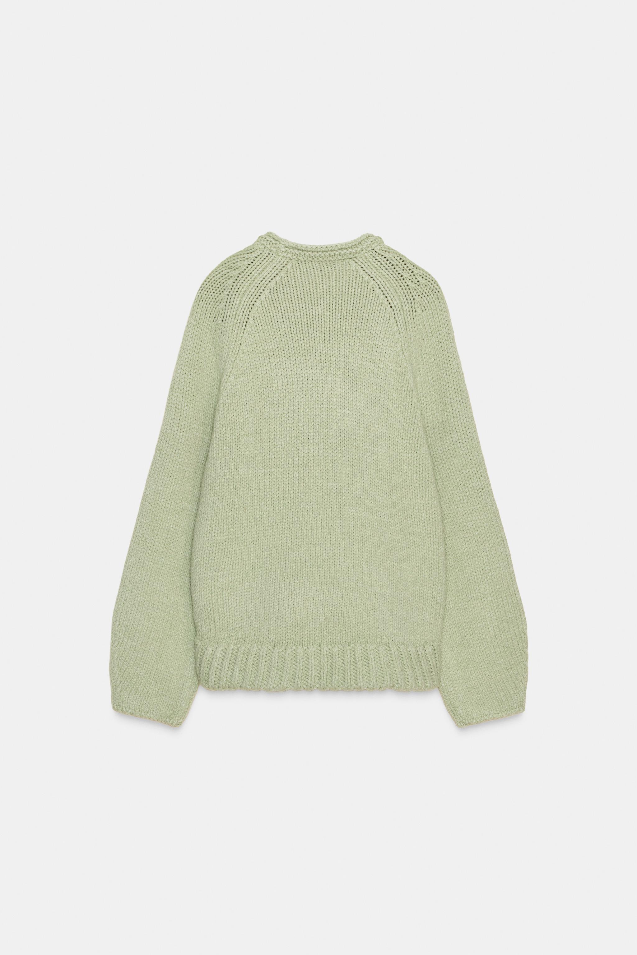 PULL EN MAILLE À BAS ASYMÉTRIQUE