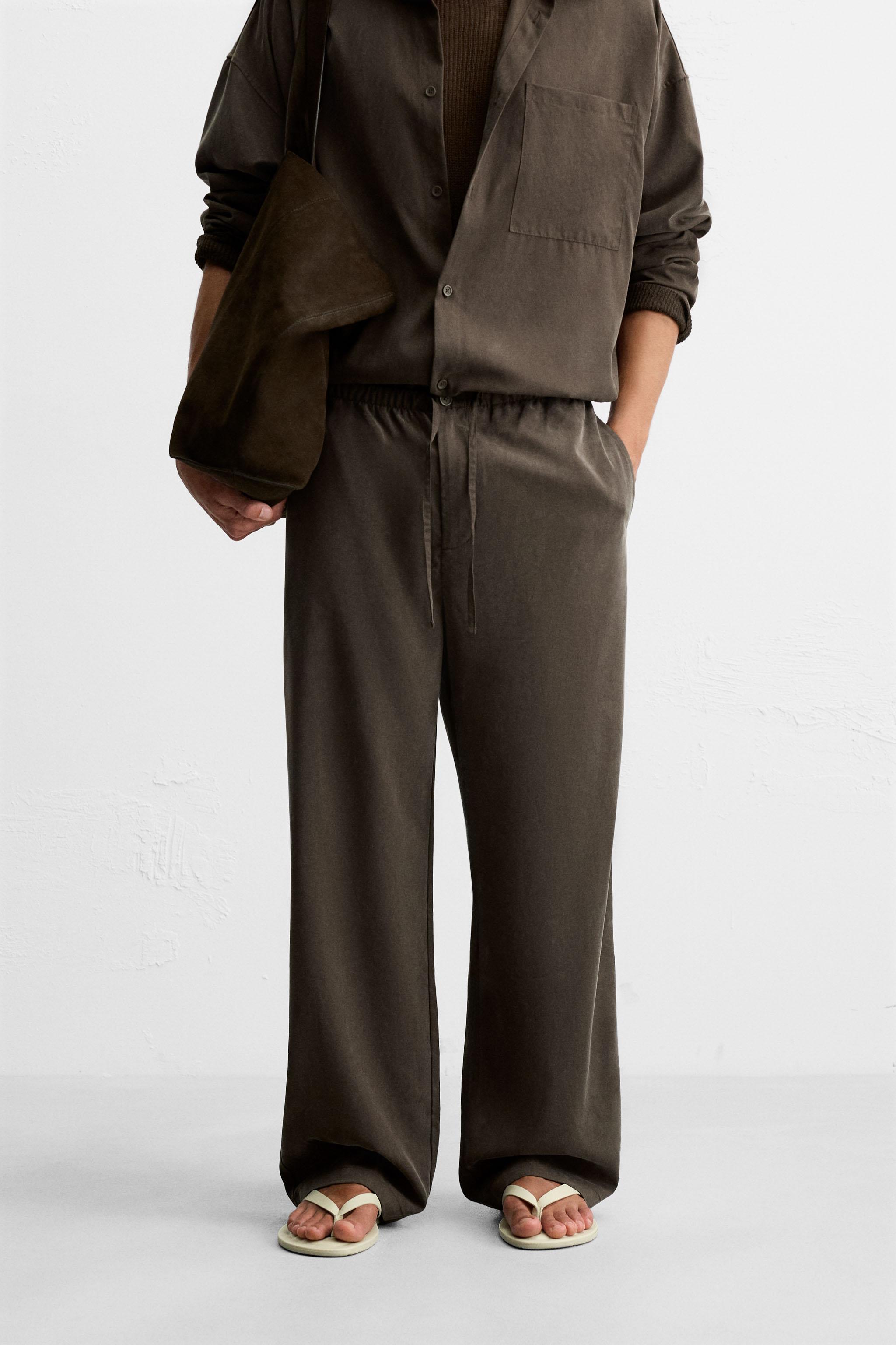 RELAXED FIT FLOWY PANTS