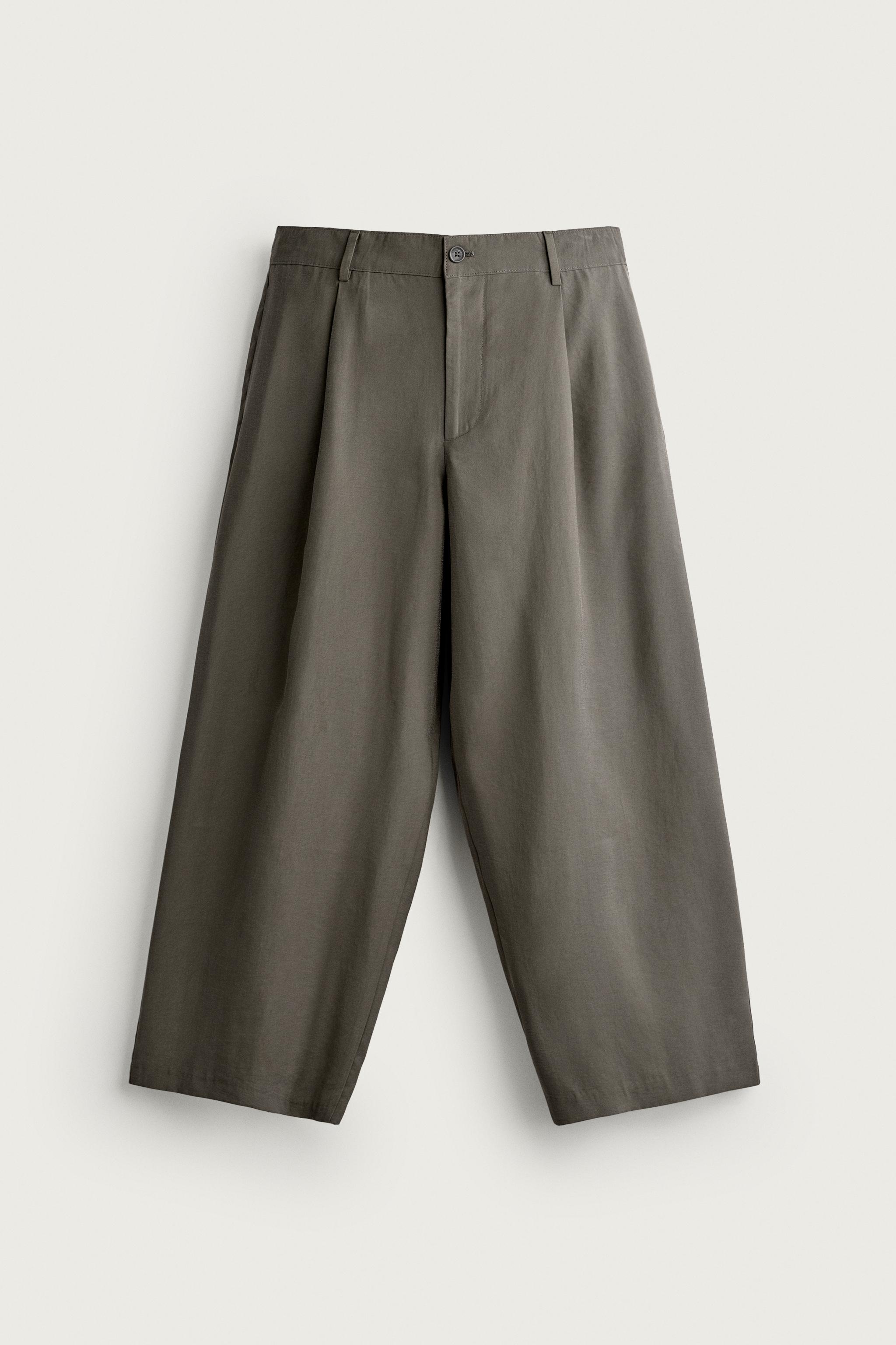 Relaxed-Fit Pleated Fluid Trousers — Ecru / Khaki