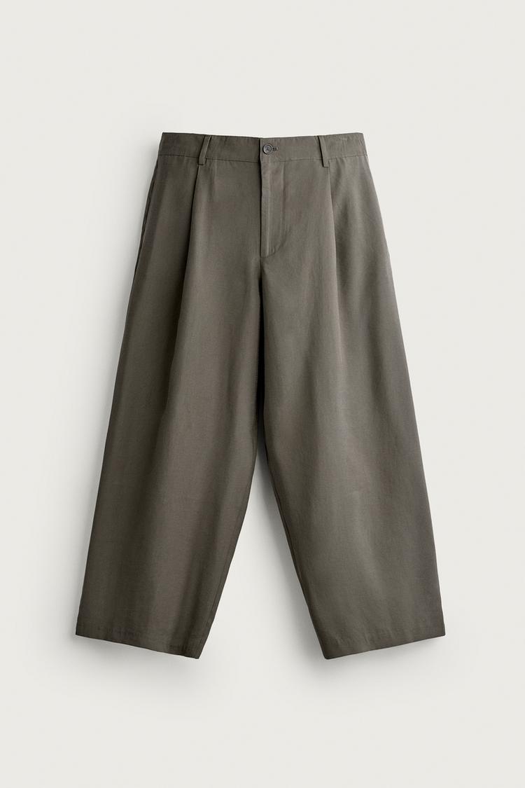 RELAXED FIT PLEATED TROUSERS