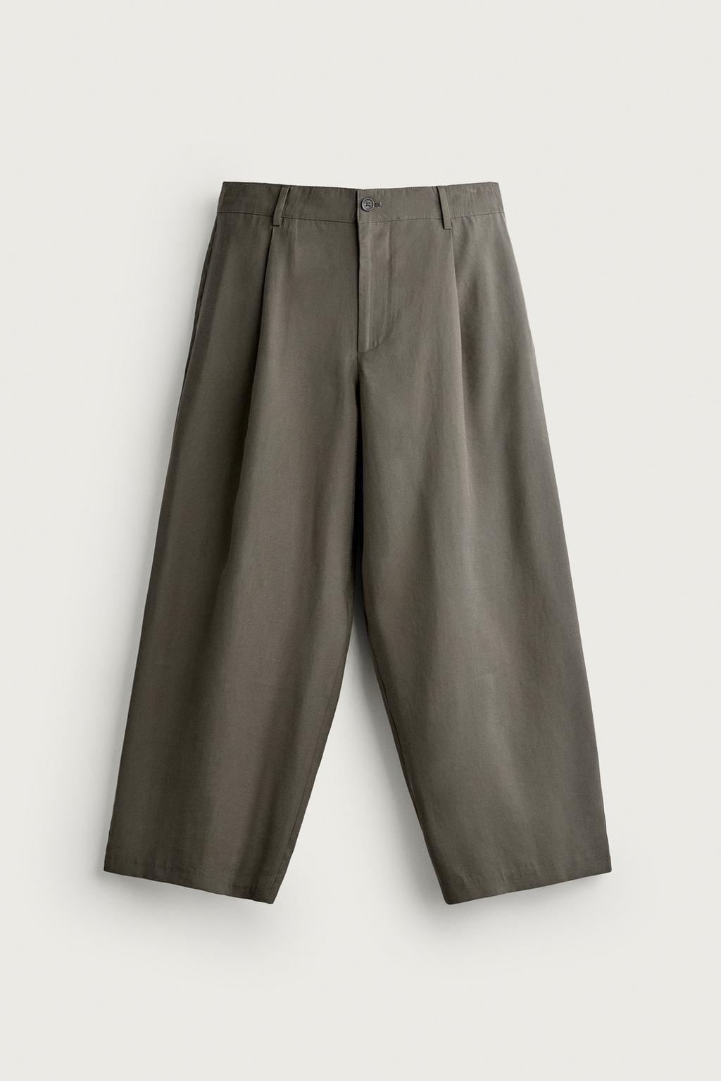 RELAXED FIT PLEATED TROUSERS