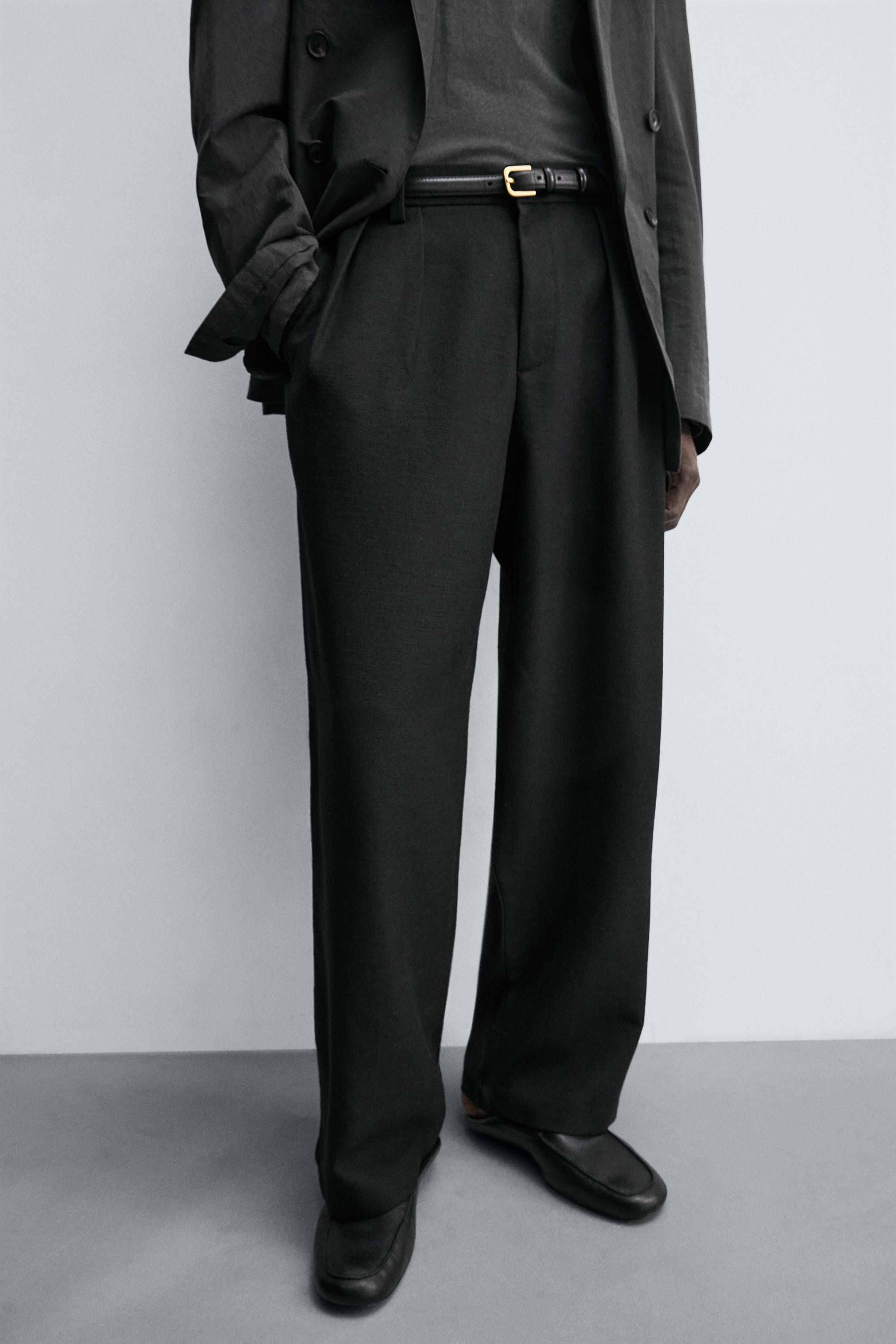 PLEATED RELAXED FIT PANTS