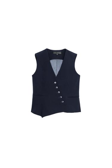 Front view of navy waistcoat with asymmetrical buttons and side pockets.