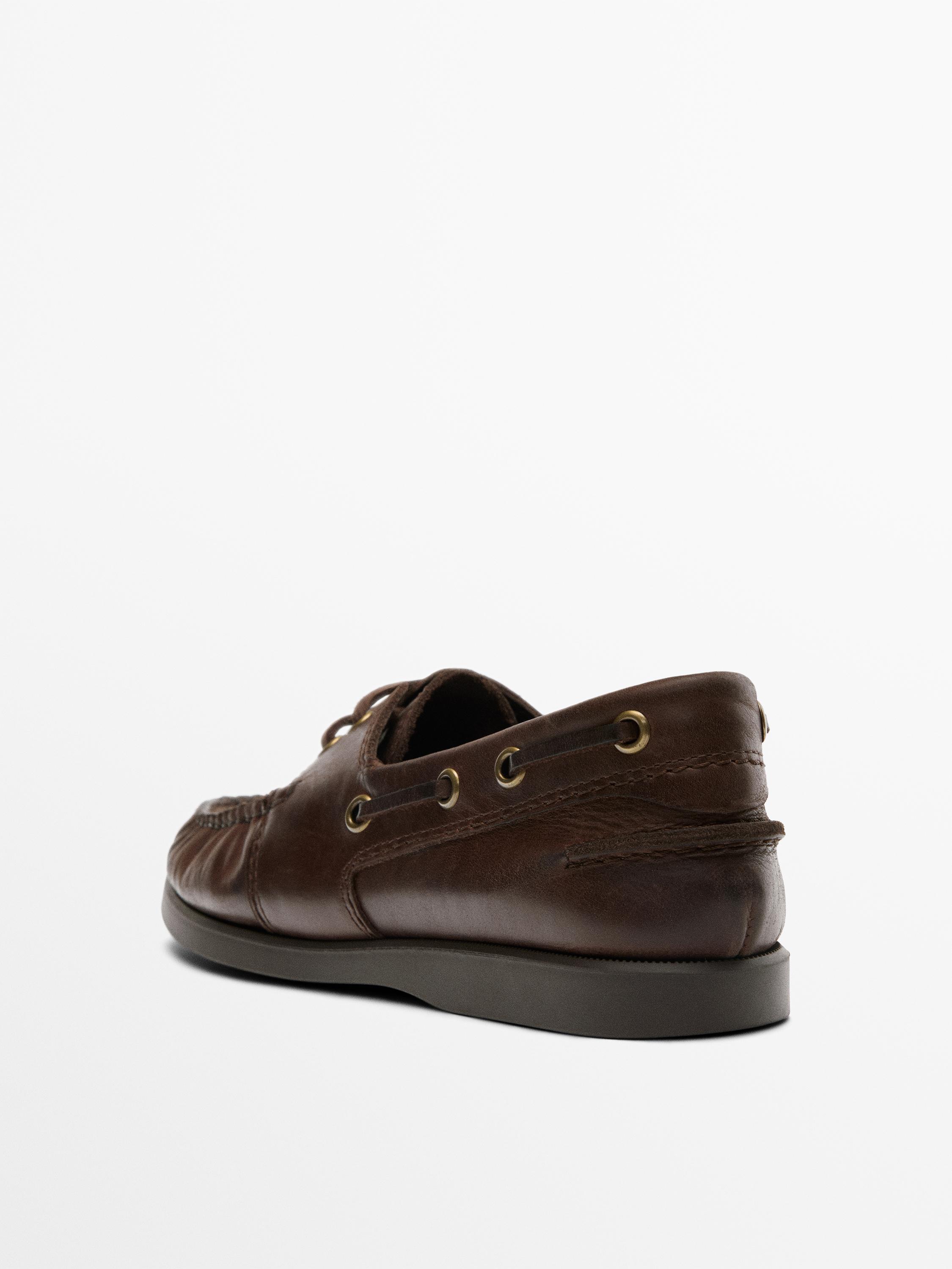 Oiled leather deck shoes