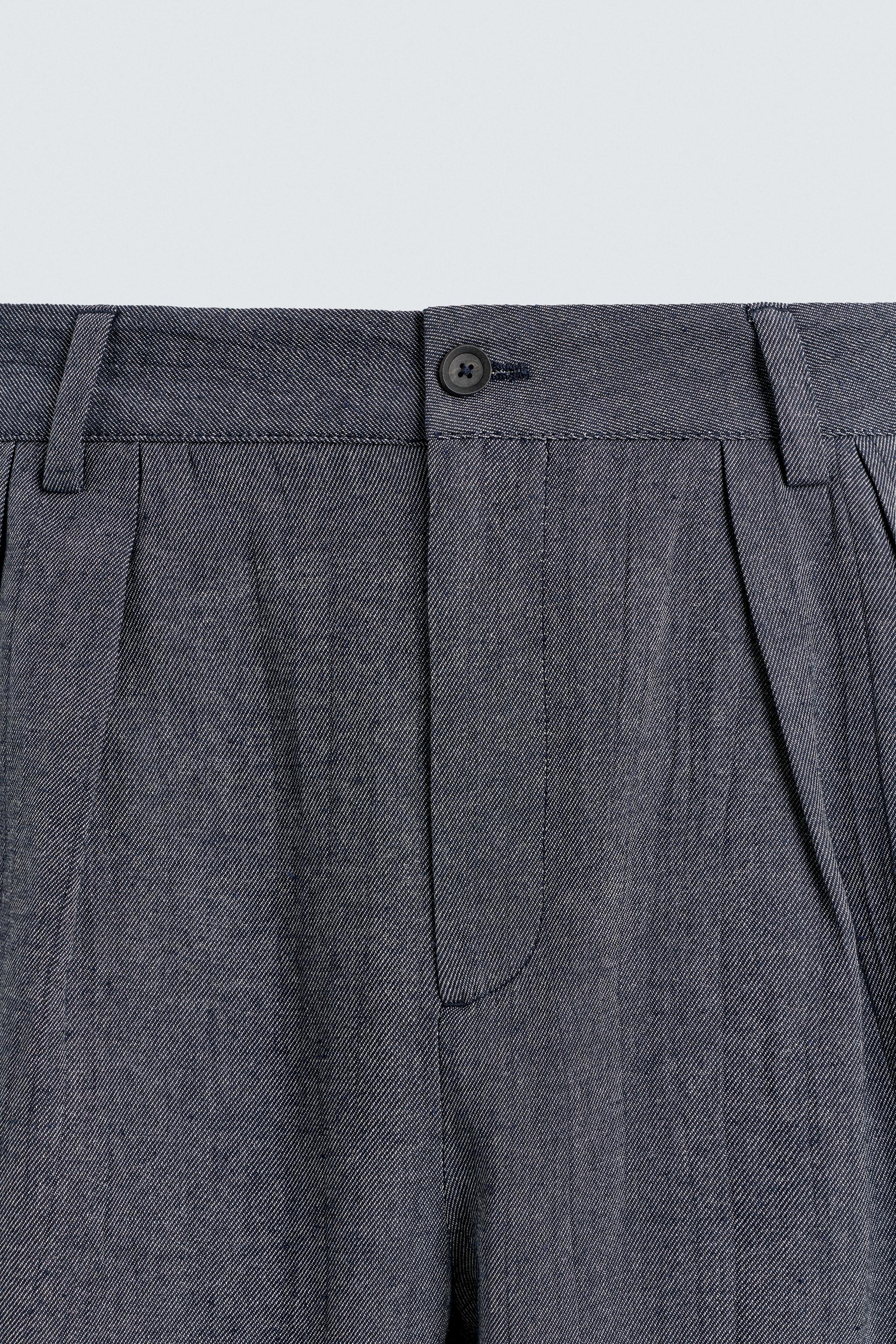PLEATED RELAXED FIT PANTS