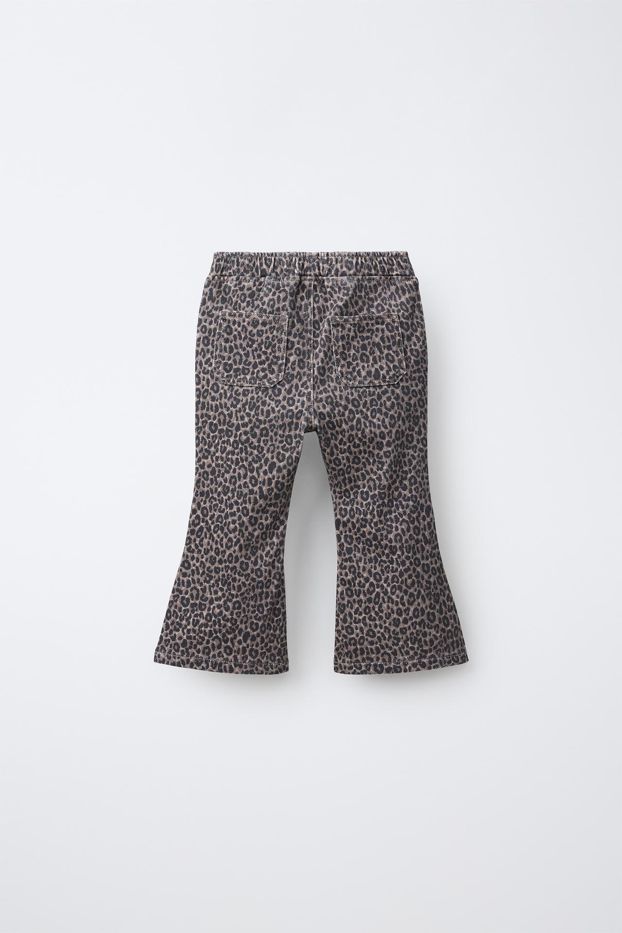 ANIMAL PRINT FLARE JEANS — Black