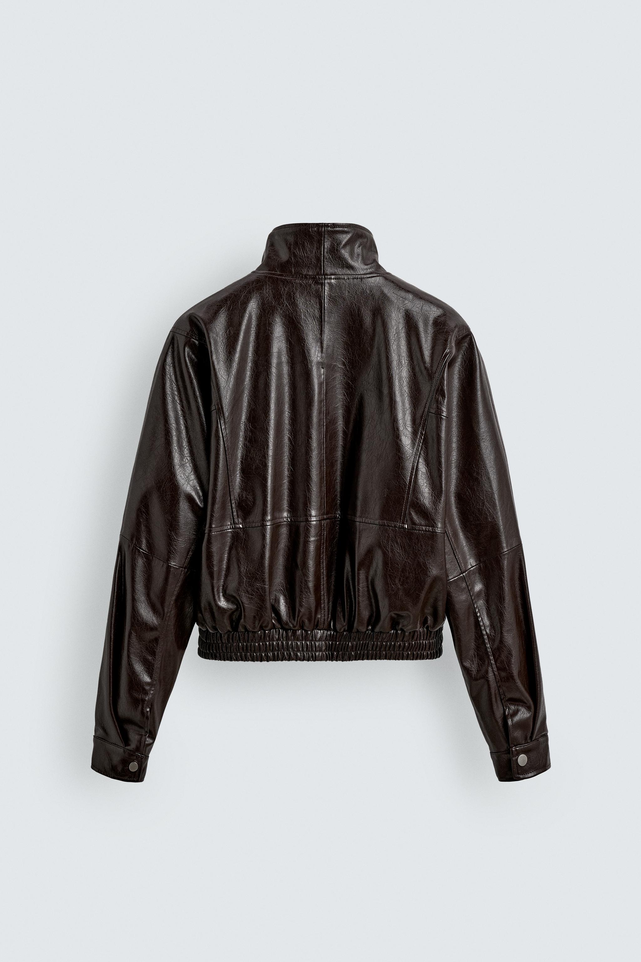 BLOUSON COURT MATIÈRE SYNTHÉTIQUE